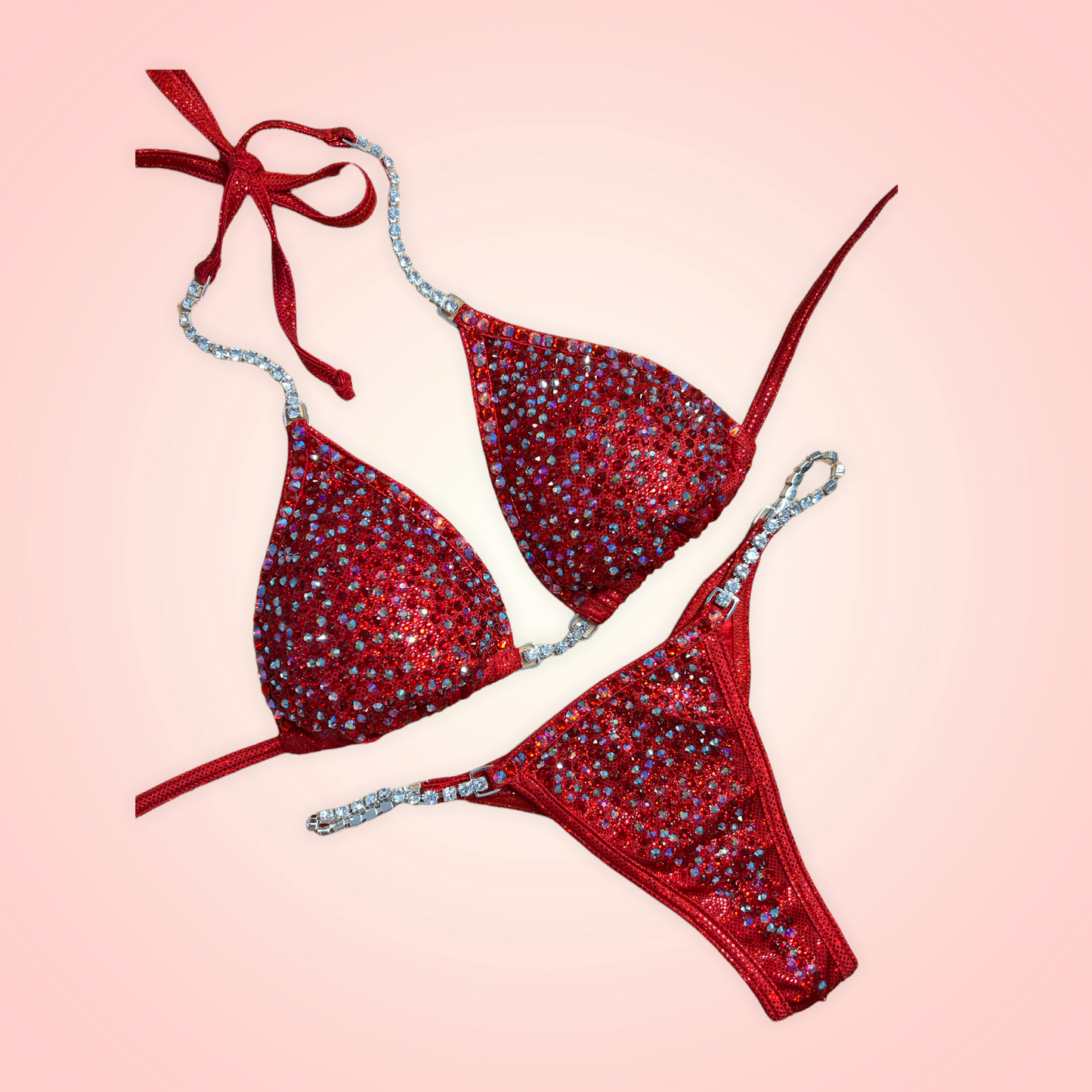 Camryn’s Fire engine red full scatter suit with trimmed crystal edge
