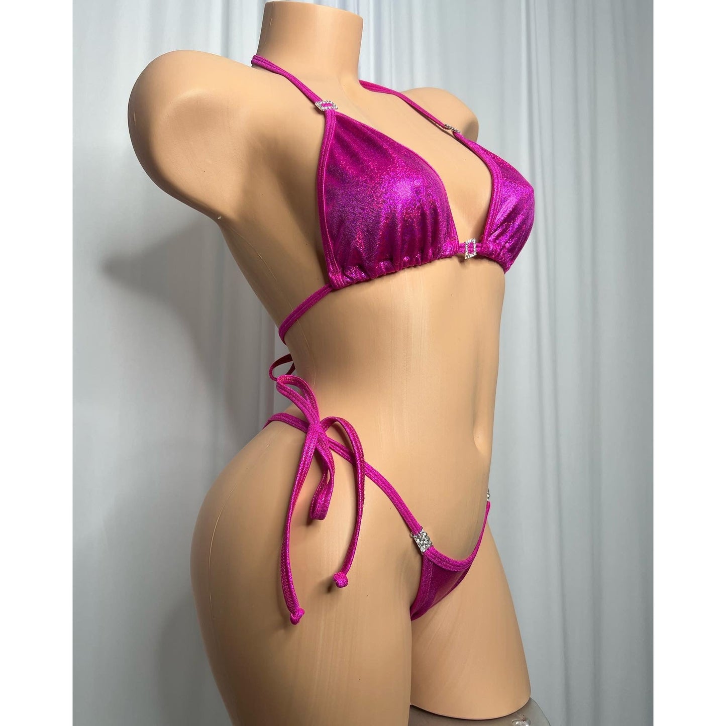 Posing suit in holographic fabric