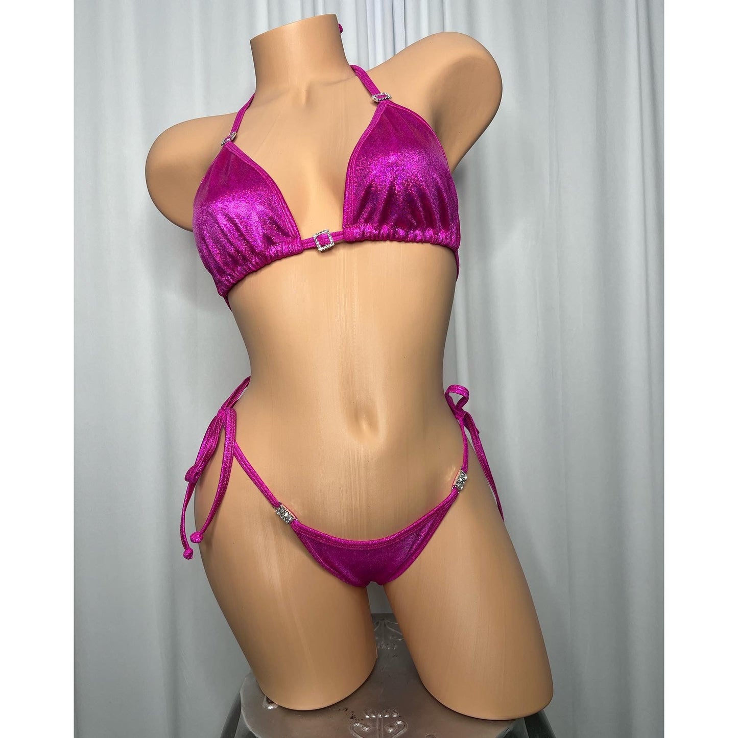 Posing suit in holographic fabric