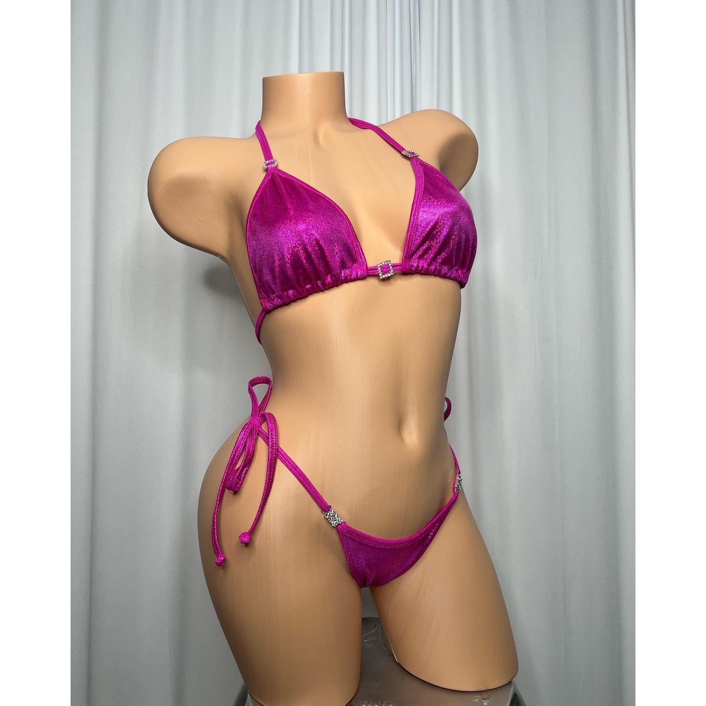 Posing suit in holographic fabric